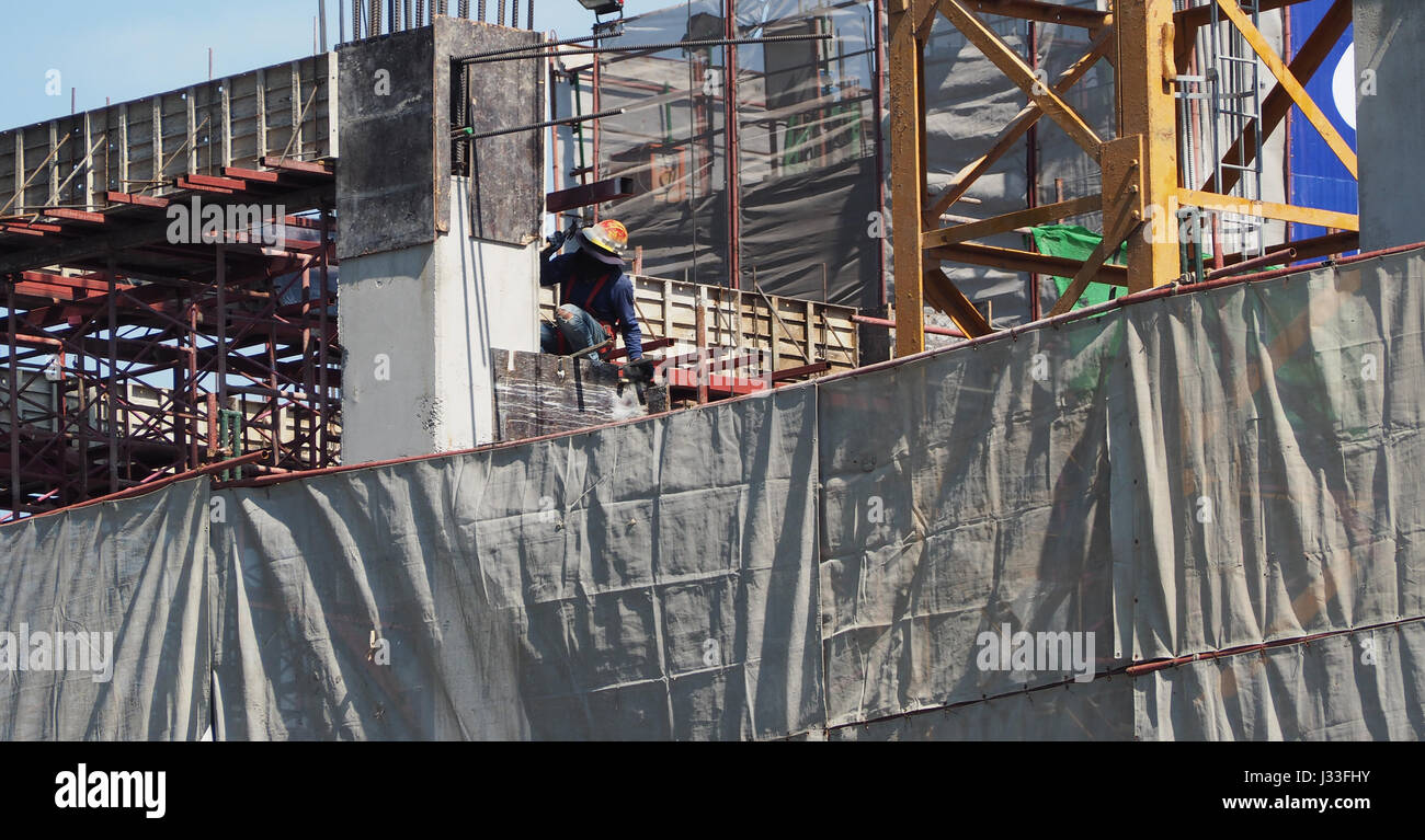 Labor or worker on building construction site and industial material ...