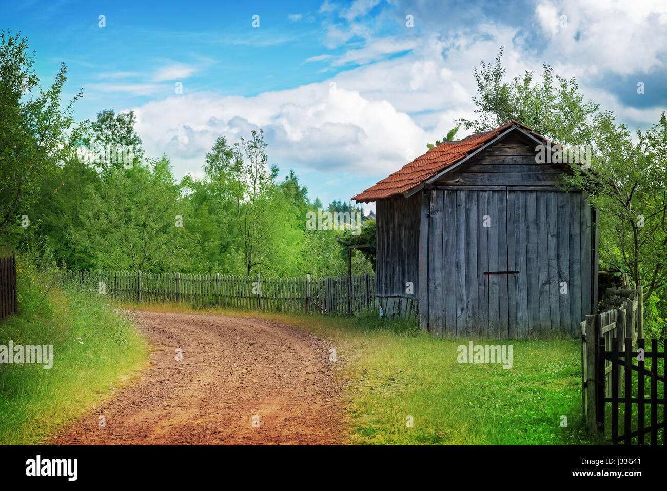 Old wooden house in the forest Stock Photo - Alamy