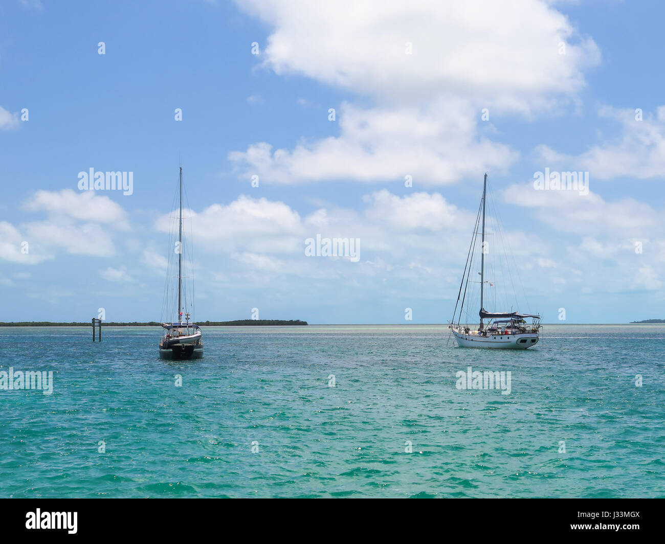Sailboats anchored in Alice Town, in the Bimini islands, Bahamas. Stock Photo