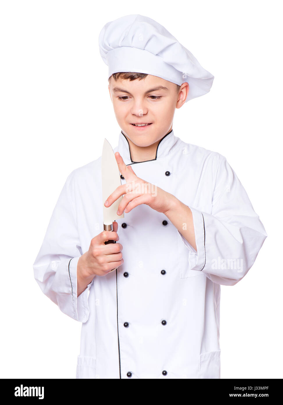 Teen boy wearing chef uniform Stock Photo Alamy