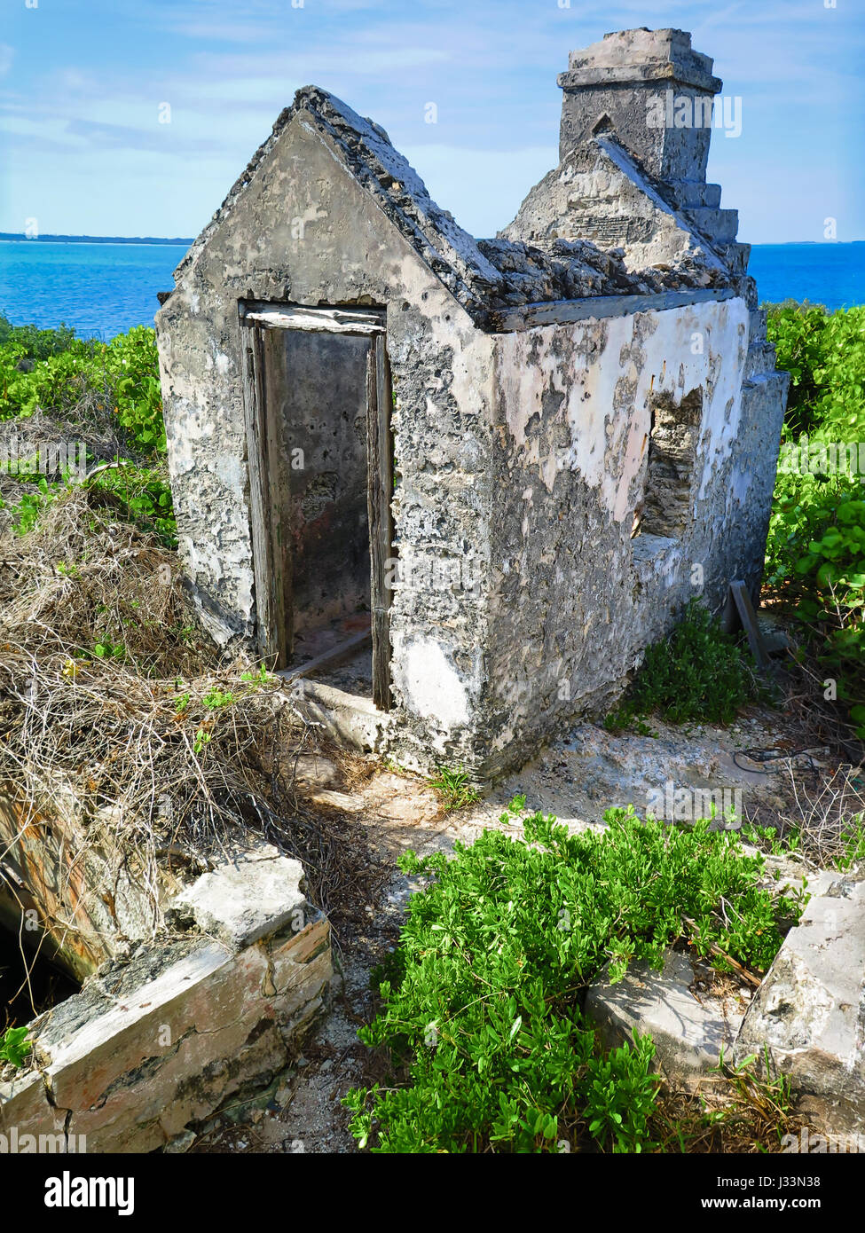 Abandoned lighthouse keeper chapel, on a small key, in Bahamas. Stock Photo