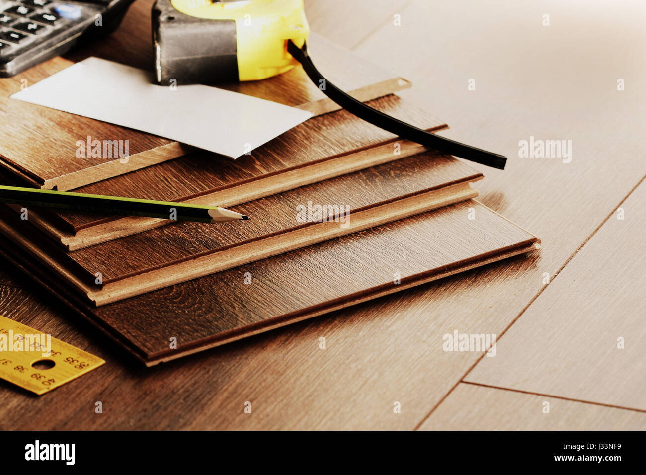 Laminate Flooring Stock Photos Images Alamy Laminate Floor Planks And Tools On Wooden Background Stock Image