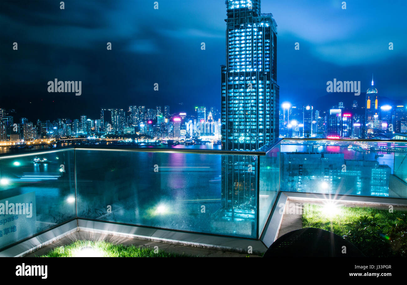 Magnificent Skyline View Over Hong Kong Chine From A Glass Balcony At Stock Photo Alamy