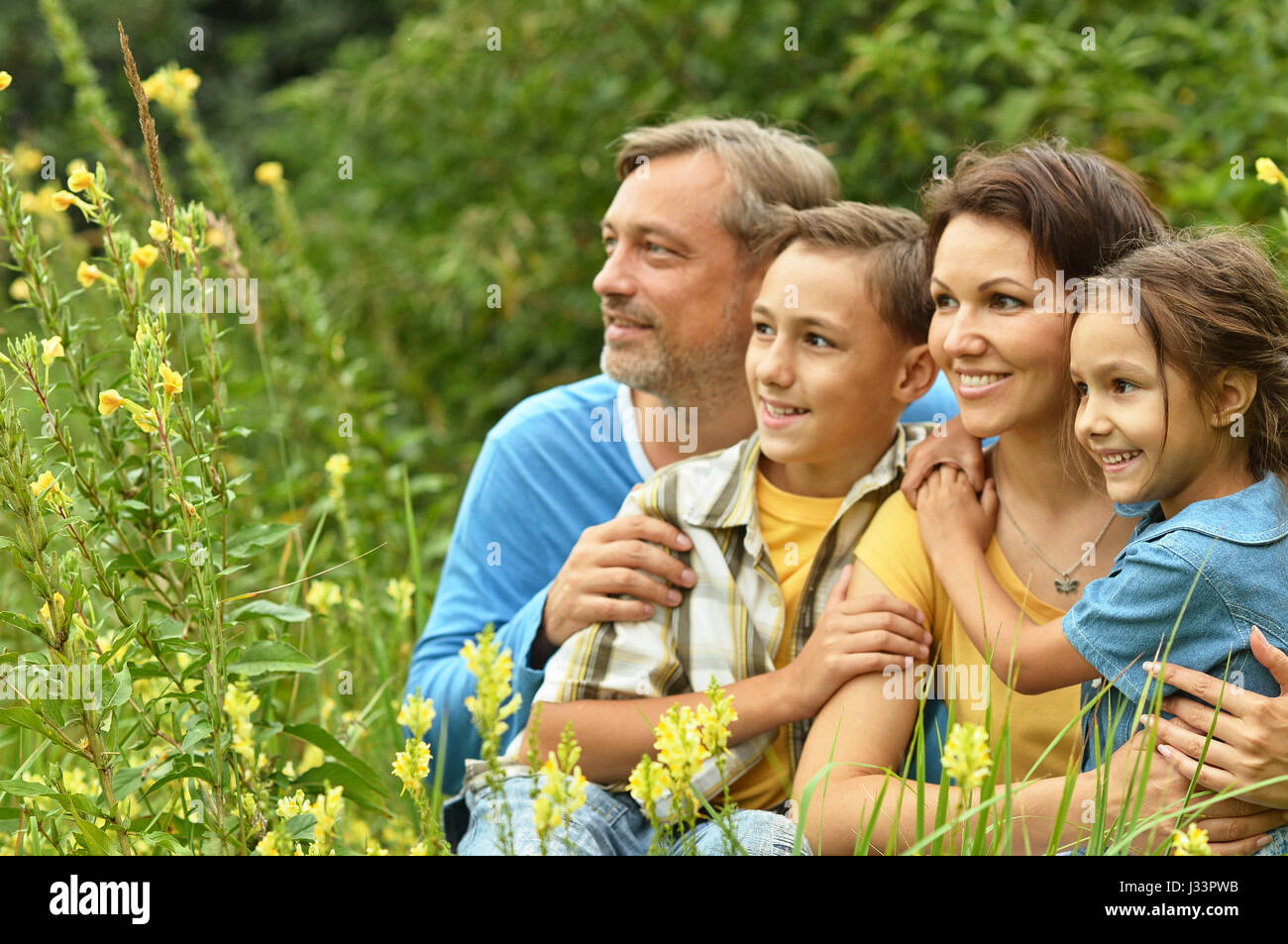 Happy parents with children  outdoors Stock Photo