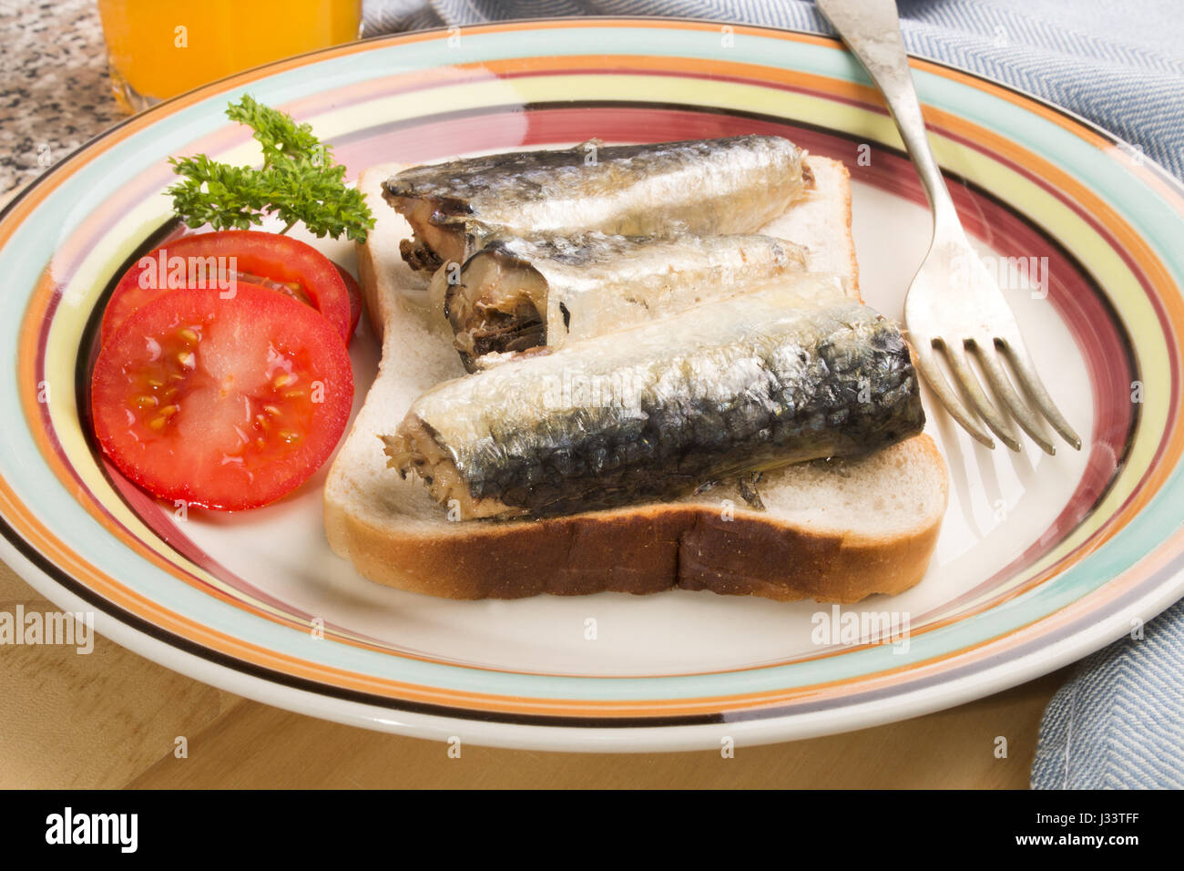 sardines in oil on a slice of fresh toast bread Stock Photo Alamy