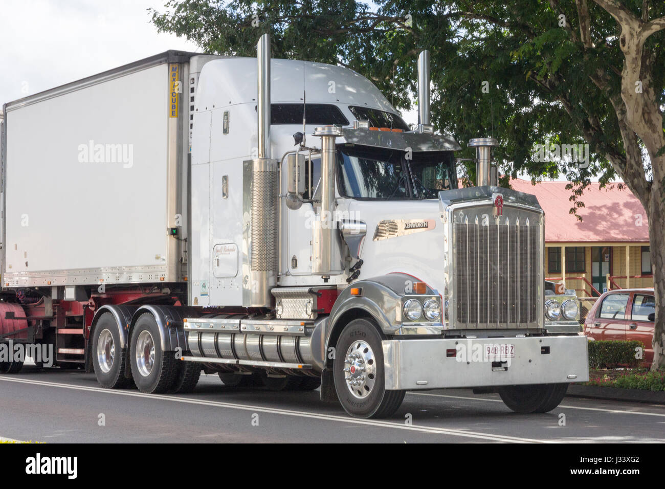 Kenworth truck driving through Childers, Queesland, Australia Stock Photo