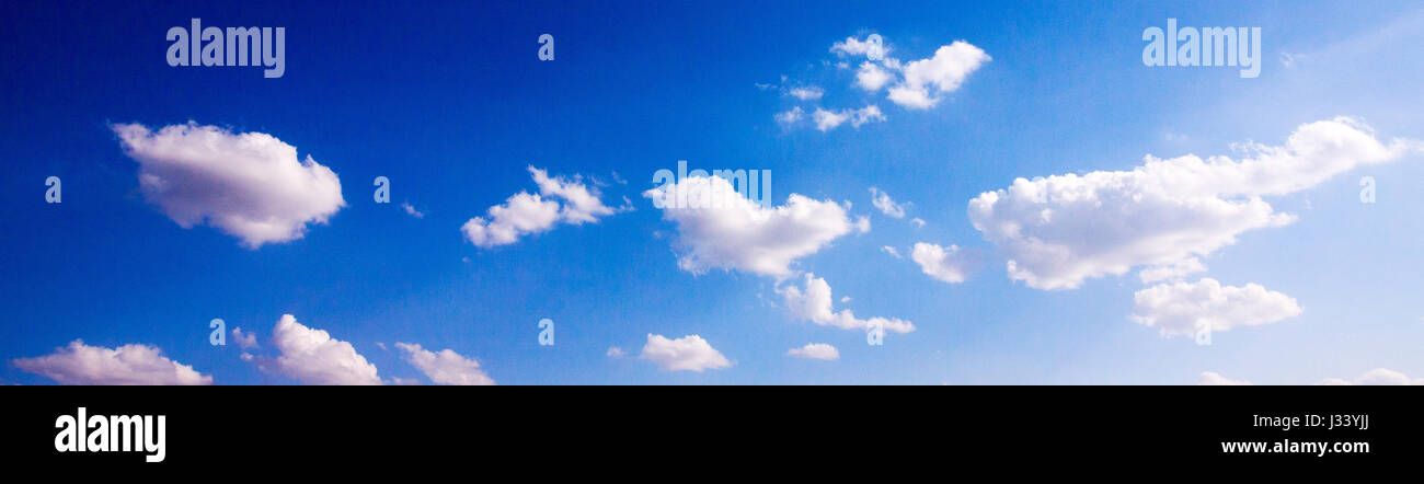 Blue sky with cumulus clouds Stock Photo - Alamy