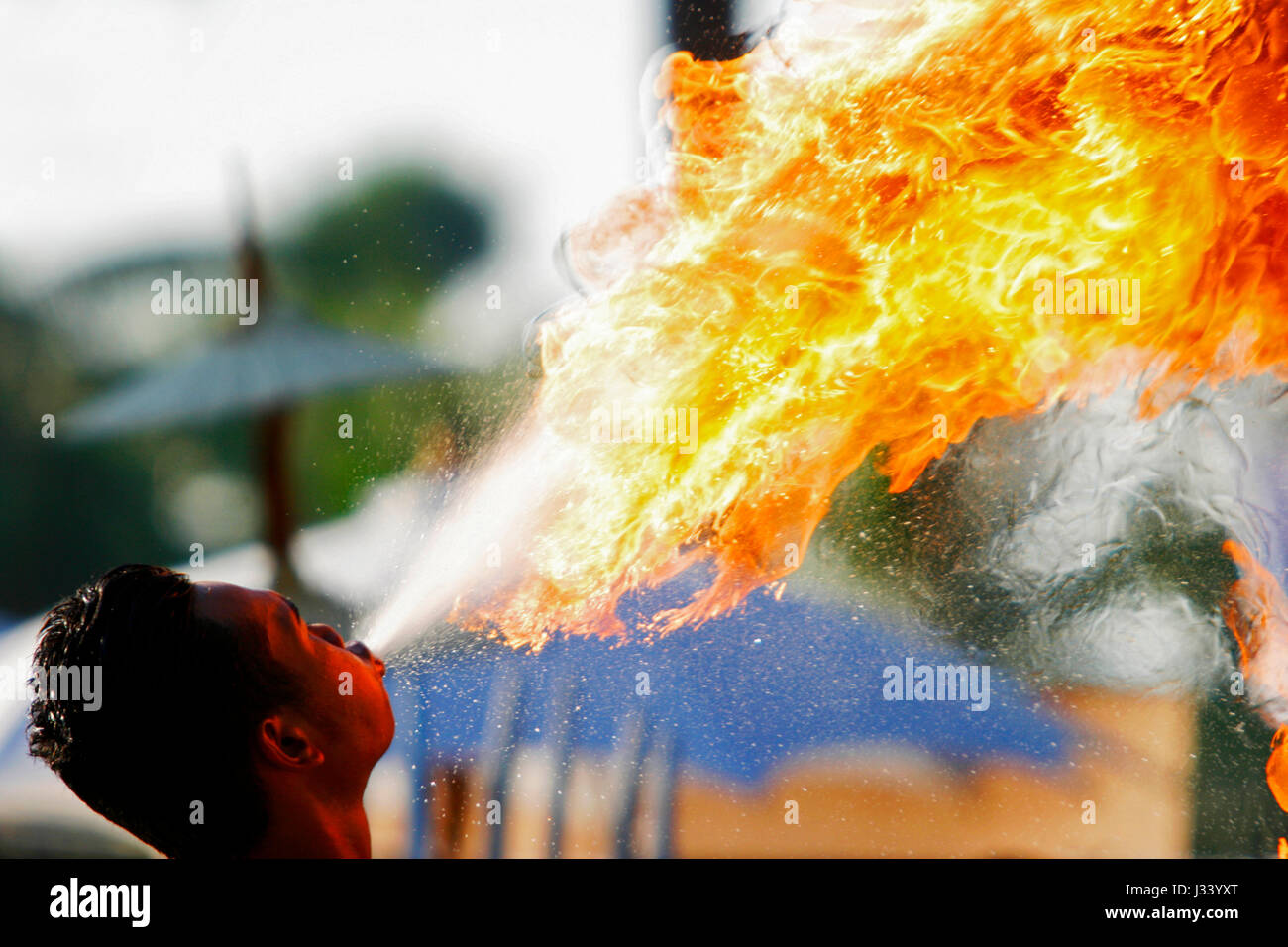 Fire breathing in occasion of the 'Loi Krathong' festival. Sukhothai, Thailand. Stock Photo