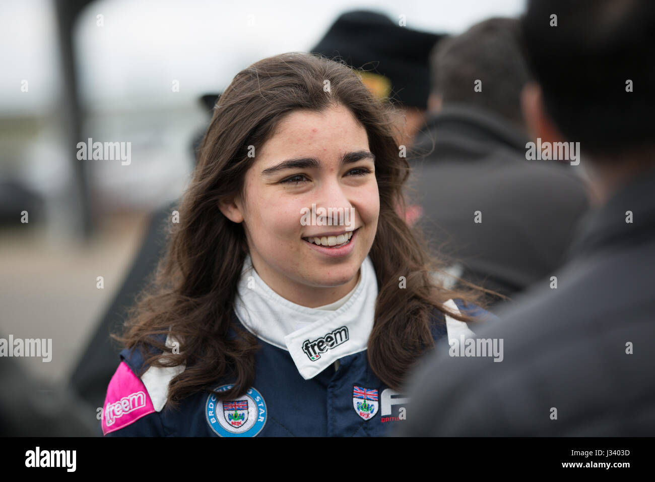 Jamie Chadwick British F3 driver talking to her crew at Rockingham ...