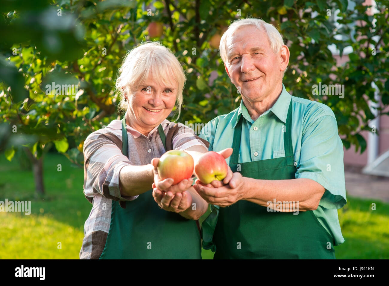 Happy male female gardeners hi-res stock photography and images - Alamy