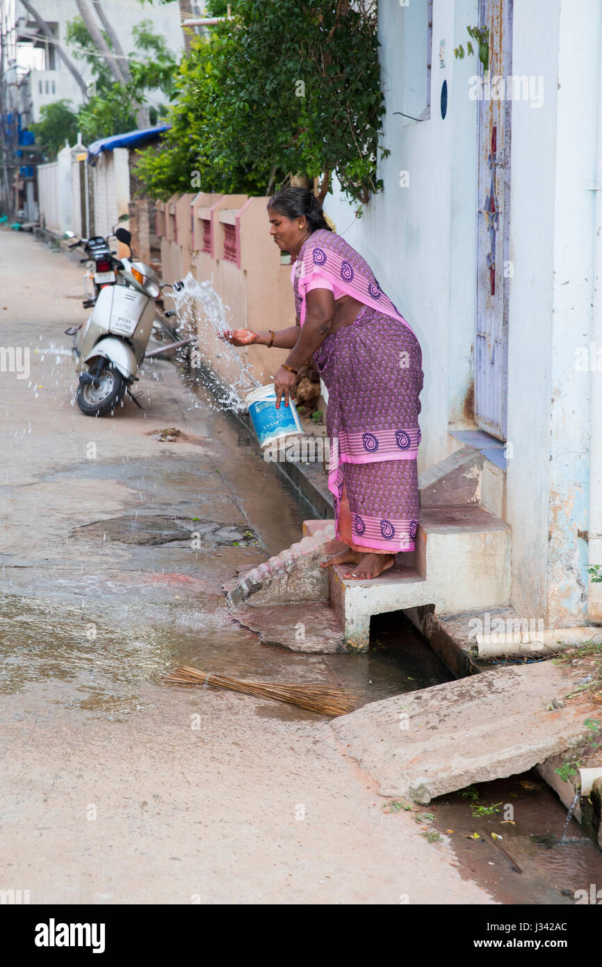 Illustrative image. Pondicherry, Tamil Nadu, India - April 21, 2014. Scenes of life in small poor villages, way of life, poverty for many woman, man,  Stock Photo