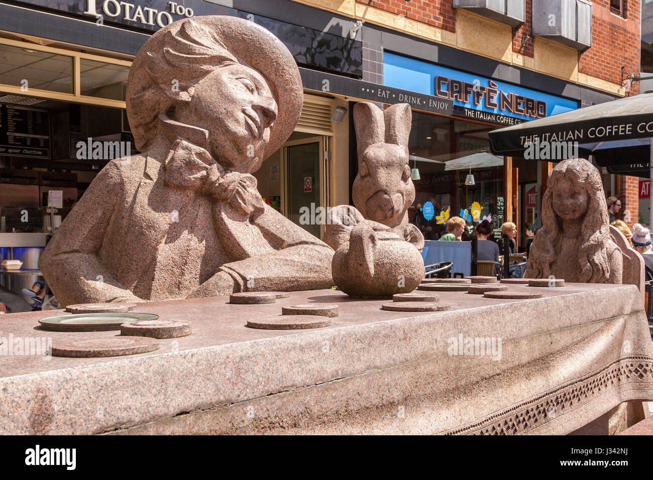 Alice in Wonderland statue in Golden Square. Warrington town centre. Stock Photo