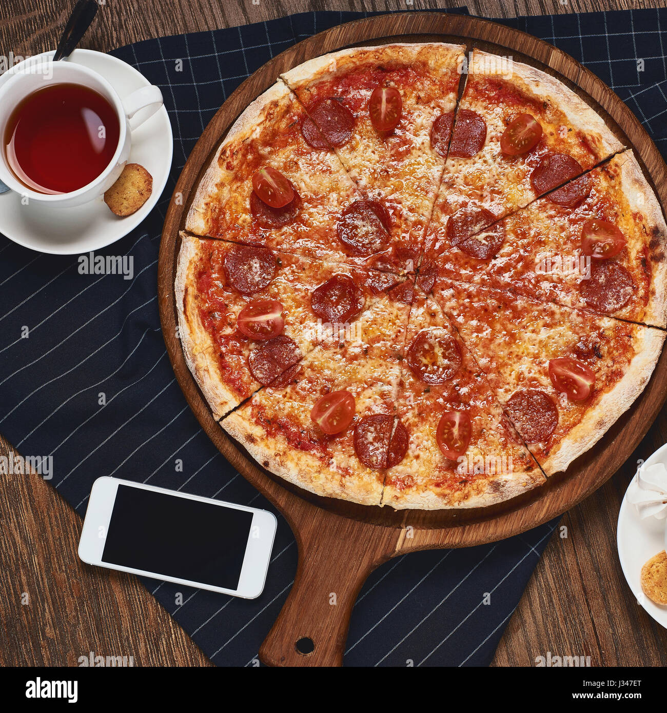 Pizza on table Stock Photo Alamy