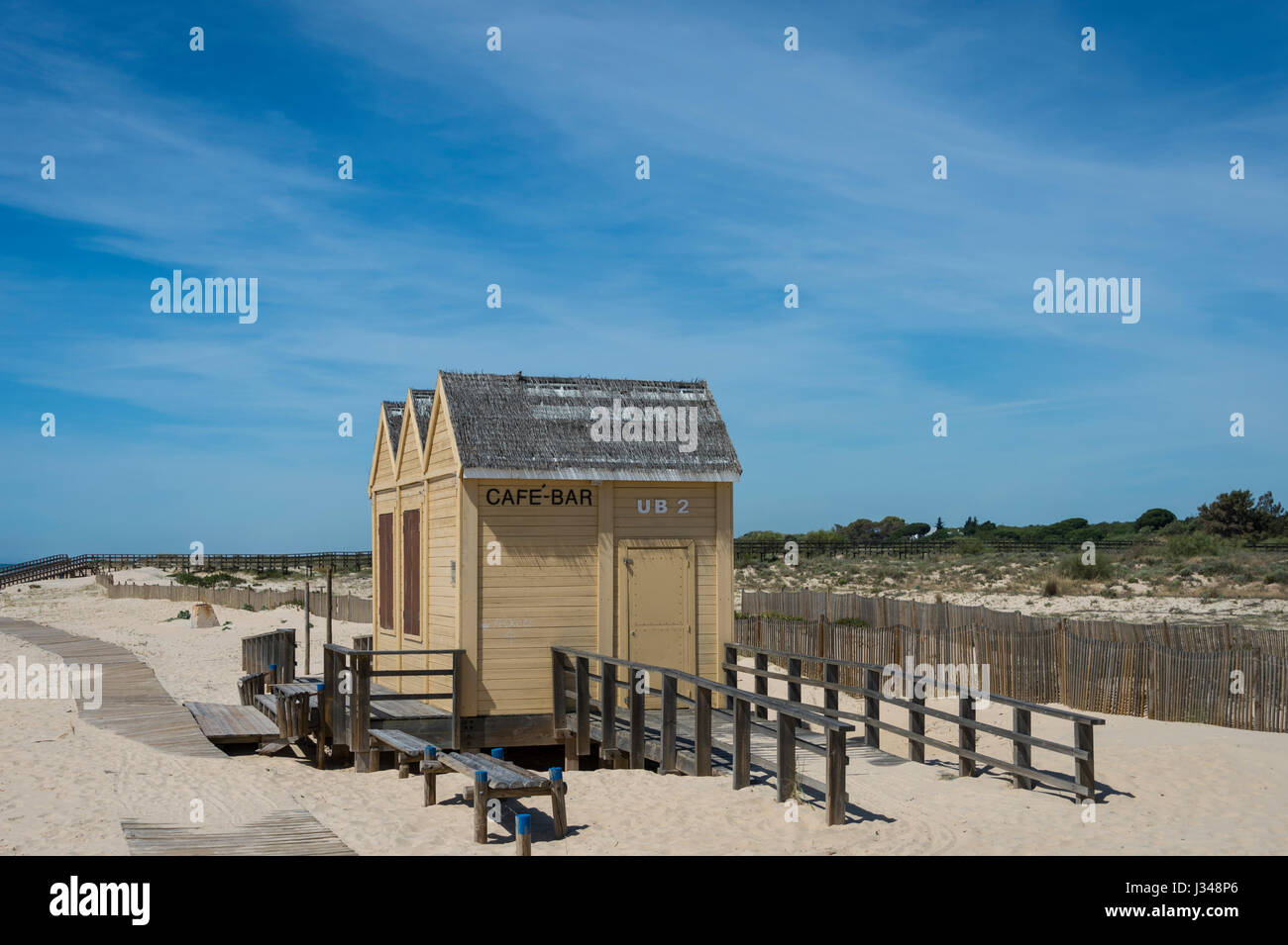 wooden bar, cafe on the beach at Priaia de Manta Rota, Portugal Stock Photo  - Alamy