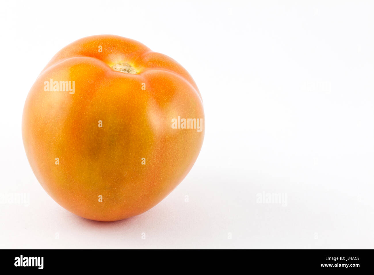 Tomato ( Lycopersicon esculentum) isolated in white background Stock Photo