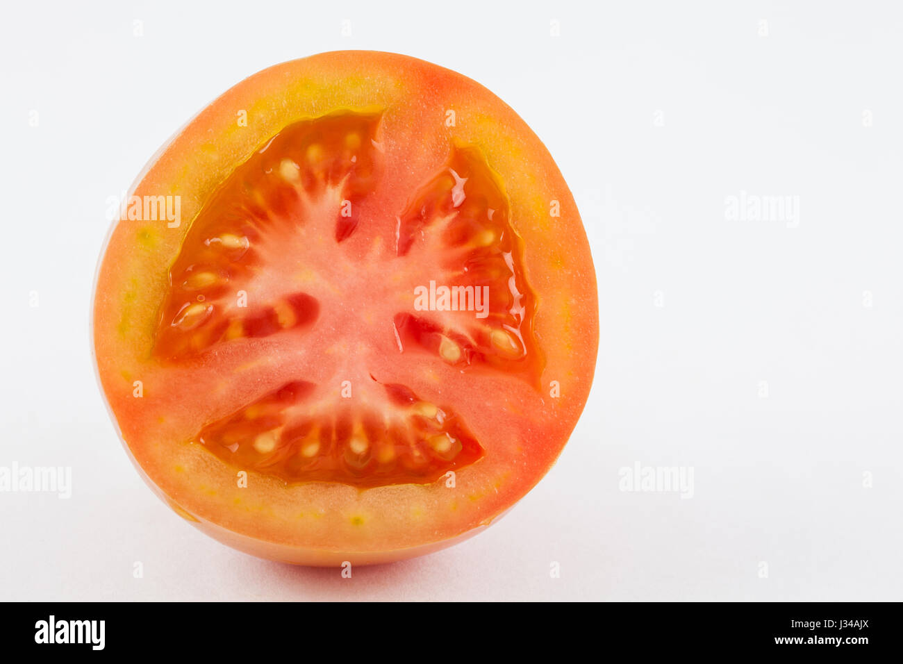 Tomato ( Lycopersicon esculentum) isolated in white background Stock Photo