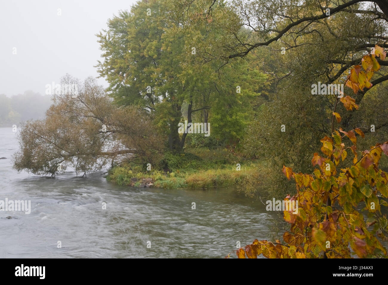 Ile des Moulins and Mille-Iles river in autumn, Old Terrebonne, Lanaudiere, Quebec, Canada Stock Photo