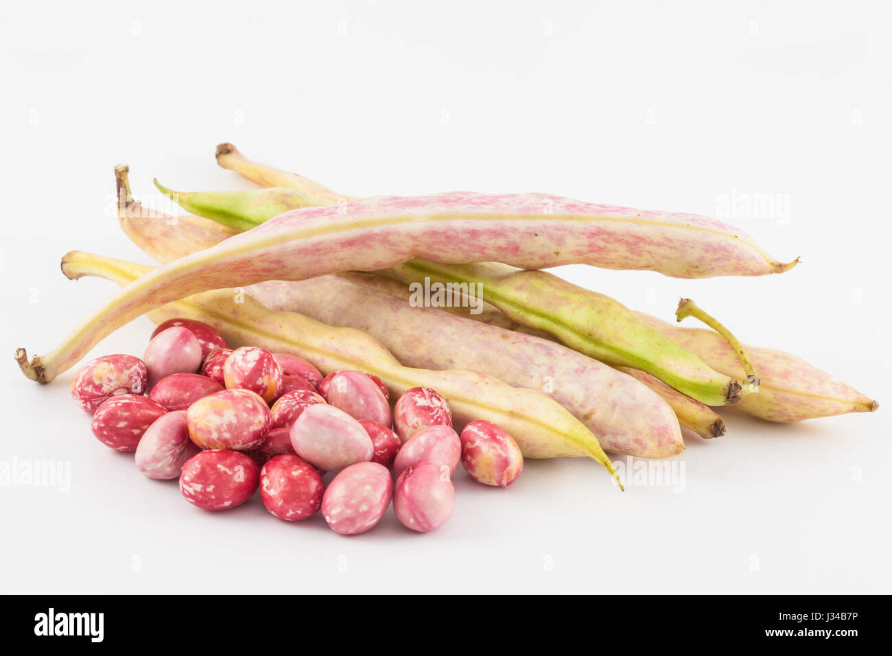 Unripe common beans (Phaseolus vulgaris) isolated in white background Stock Photo