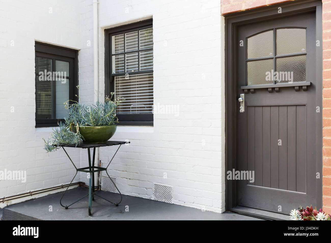 Entry porch and frnt door of an art deco style apartment in Australia Stock Photo