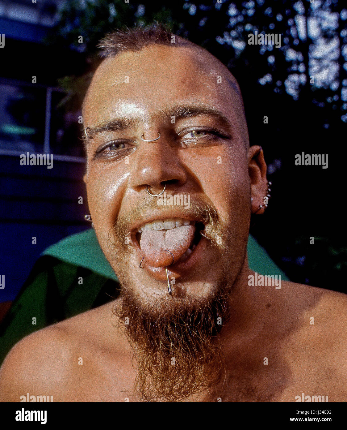 Man with body piercings at the 25th Woodstock anniversary music