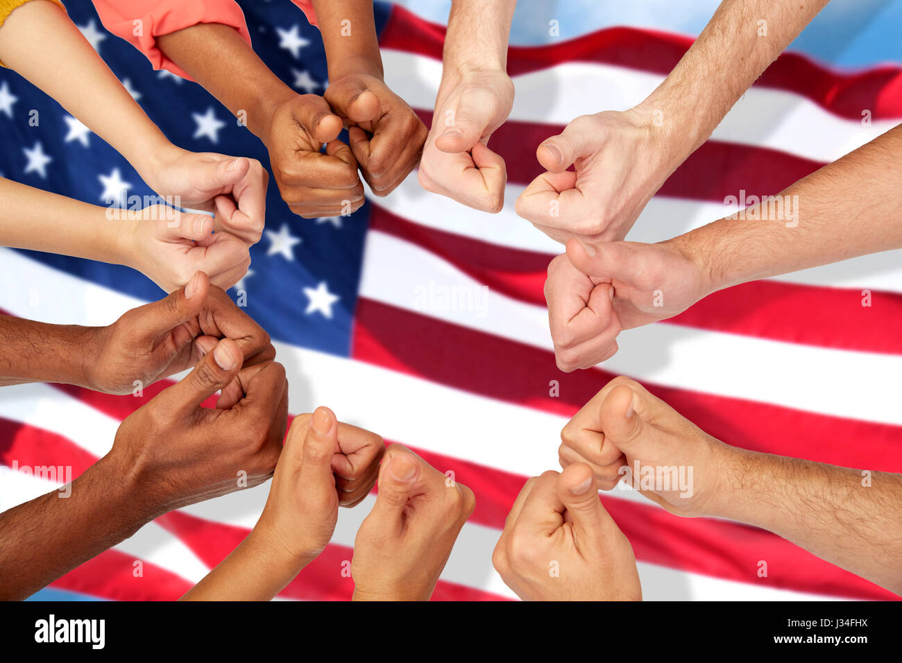 hands of international people showing thumbs up Stock Photo