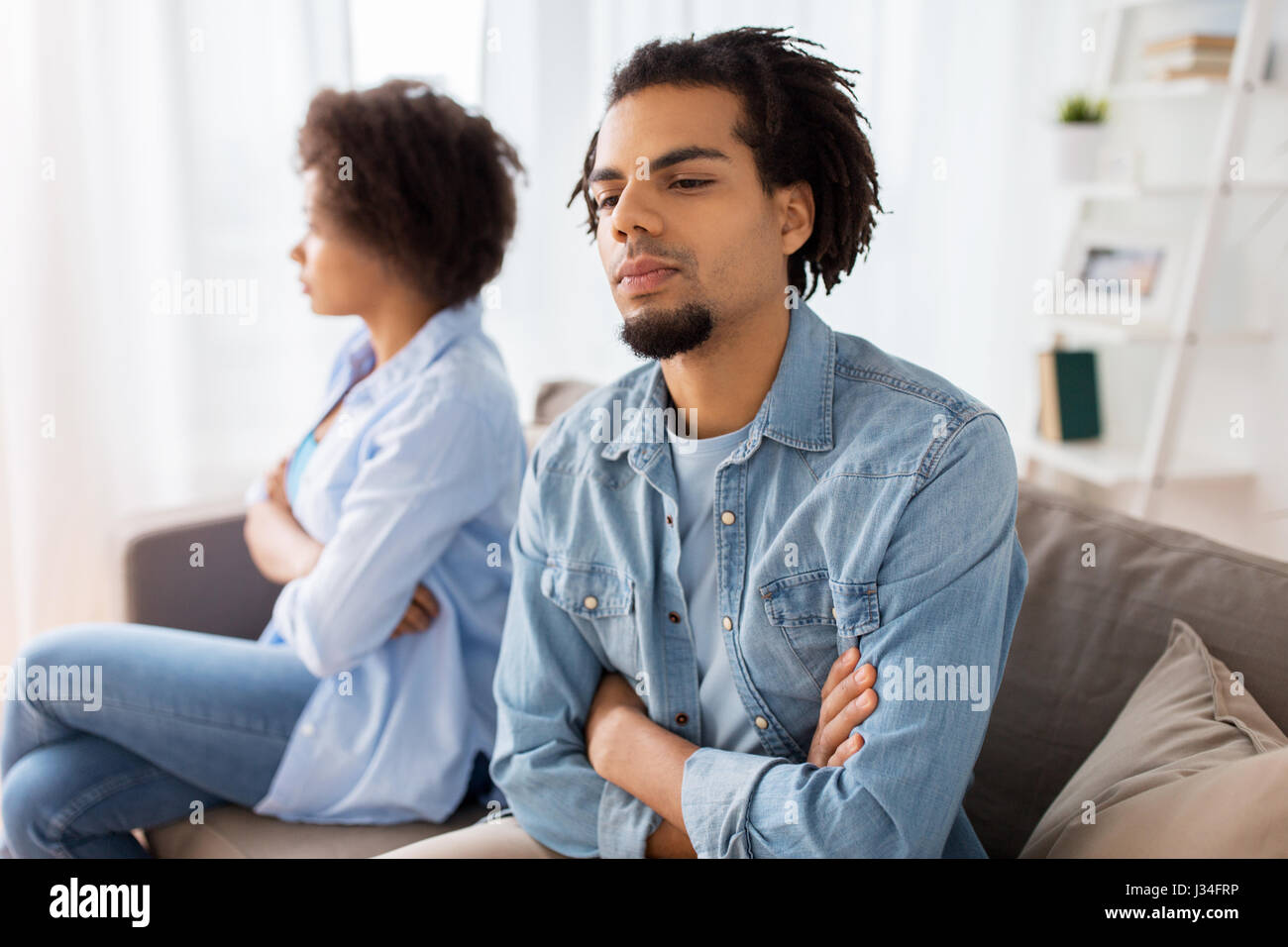 unhappy couple having argument at home Stock Photo Alamy