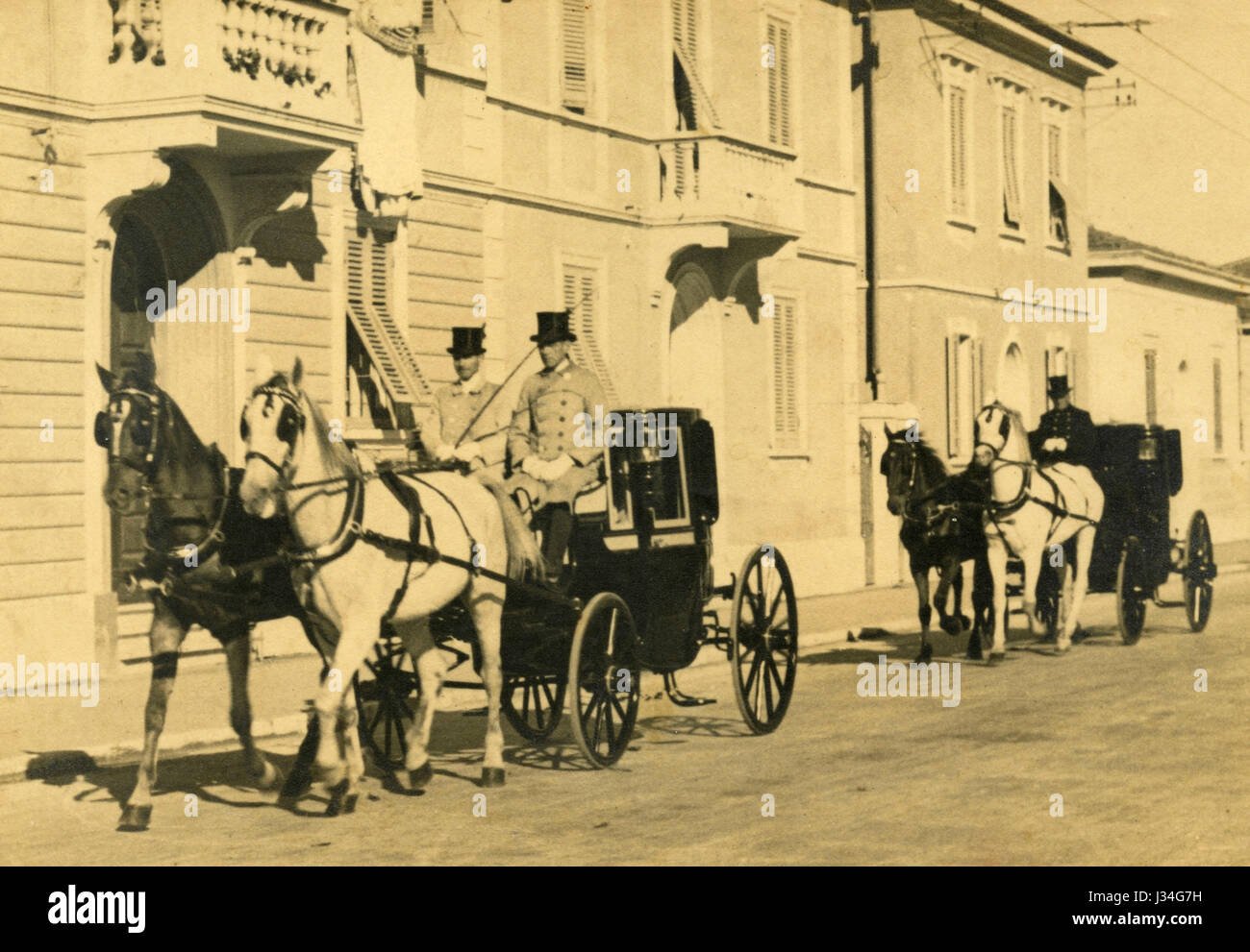 Two horse-drawn carriage, Italy Stock Photo