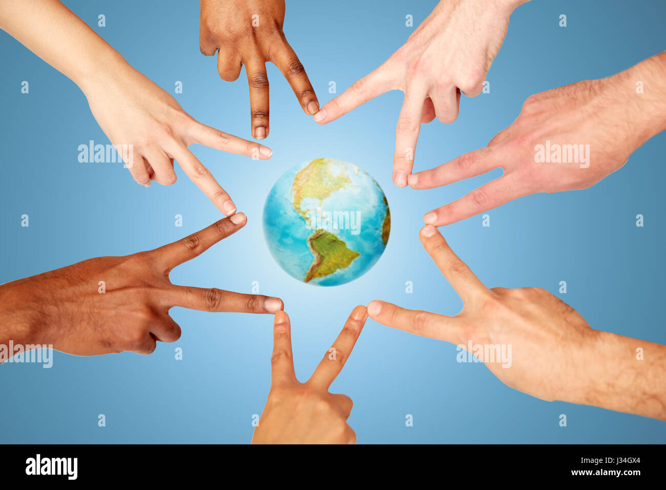 group of international people showing peace sign Stock Photo