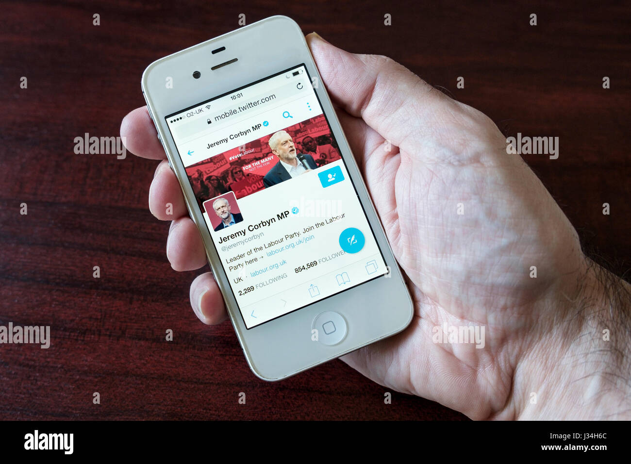 Jeremy Corbyn MP Labour party twitter page ahead of the 2017 general election #GE2017 campaign viewed on a smartphone mobile phone screen Stock Photo