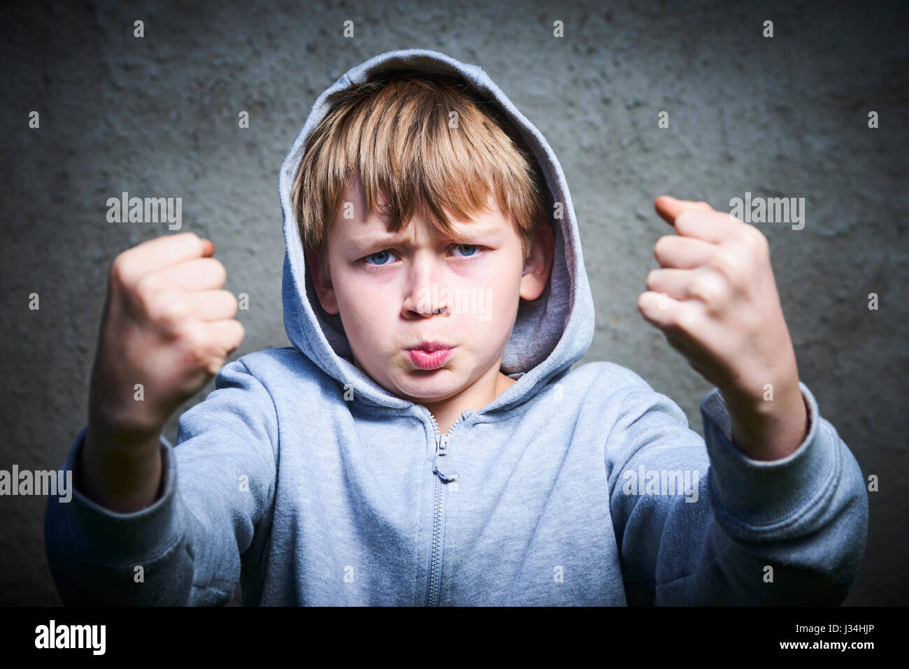 Clenched fist child hires stock photography and images Alamy