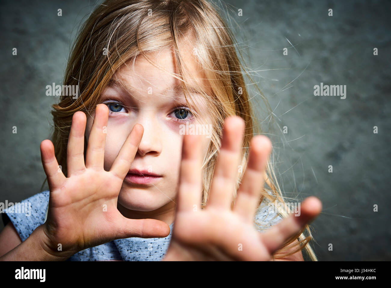 Abused child, Concept Stop violence against children. Portrait of sad