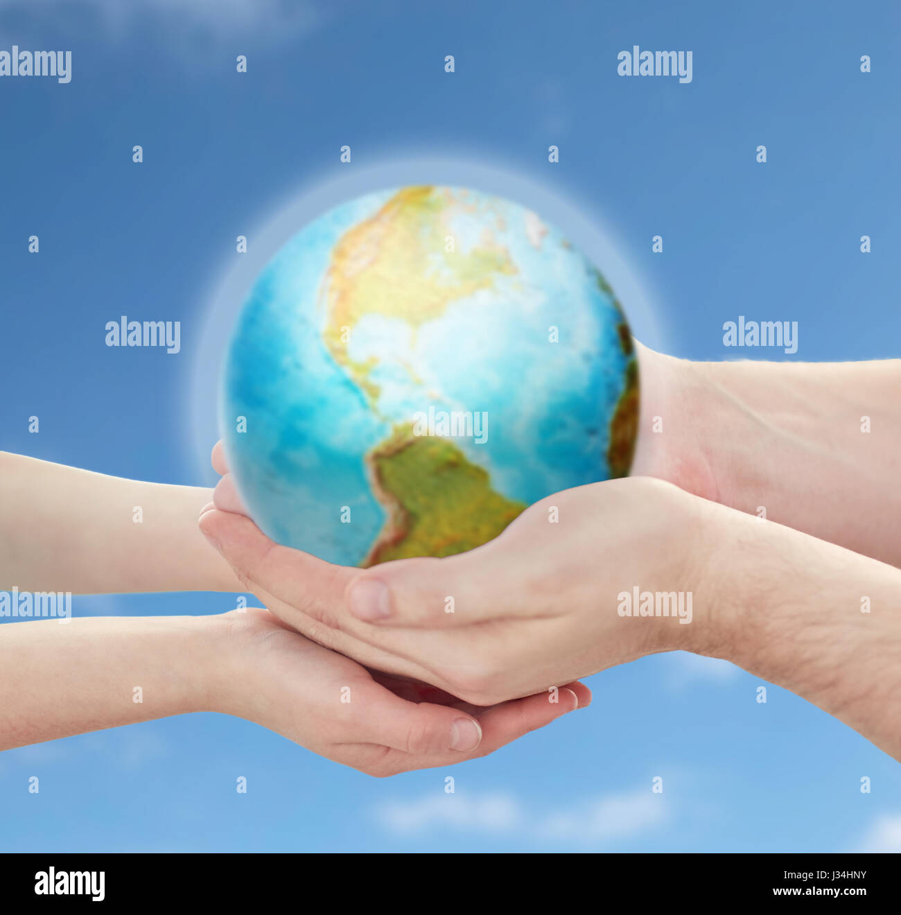 child and father hands holding earth planet Stock Photo - Alamy