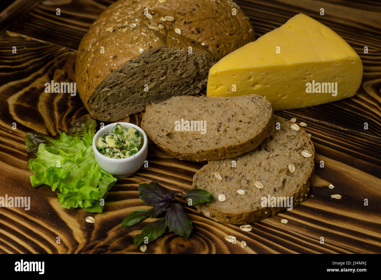 The bread and cut the slices with a large triangular piece of cheese ...