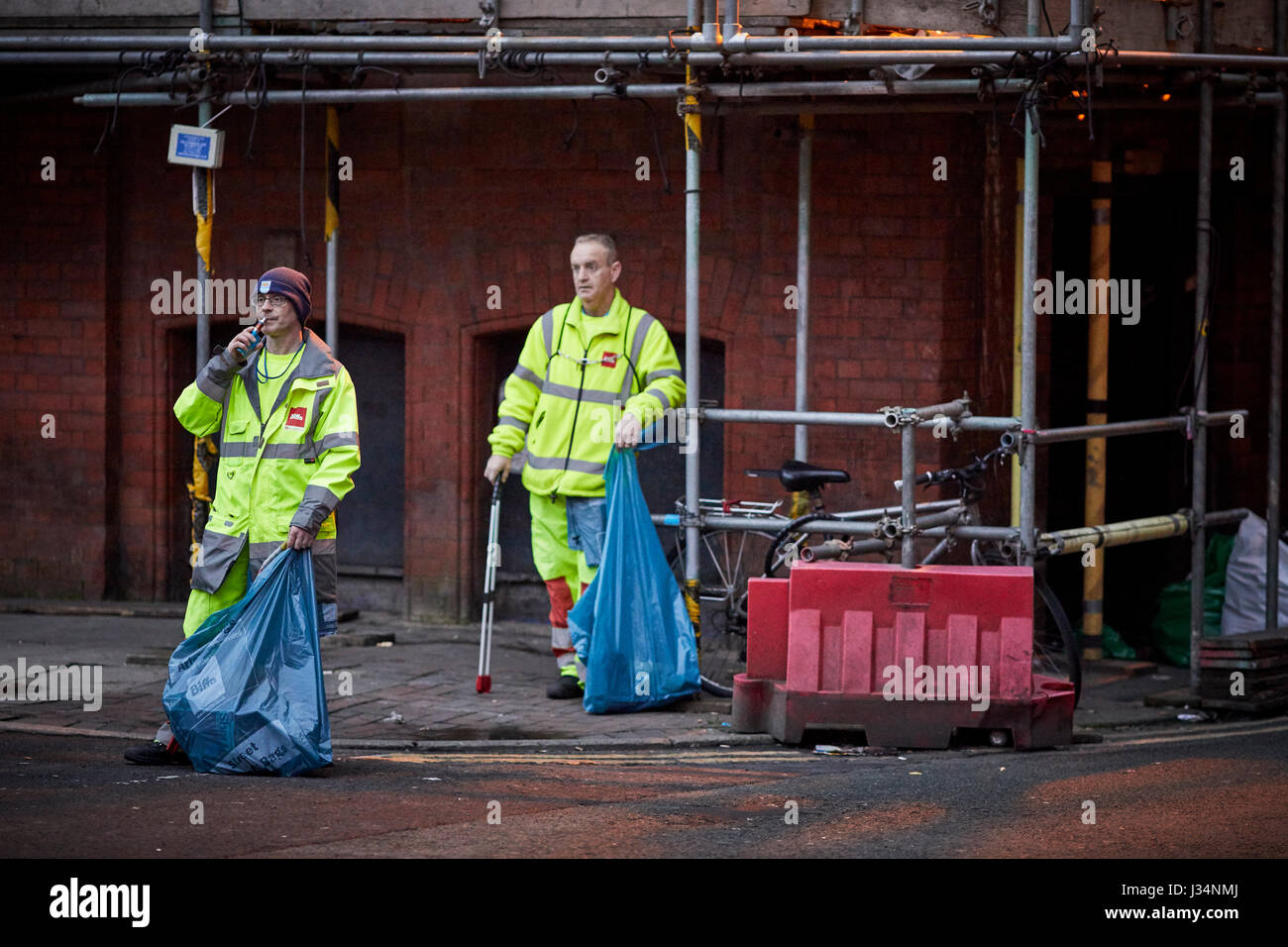 Manchester city centre Biffa street cleaners resting between work Stock Photo