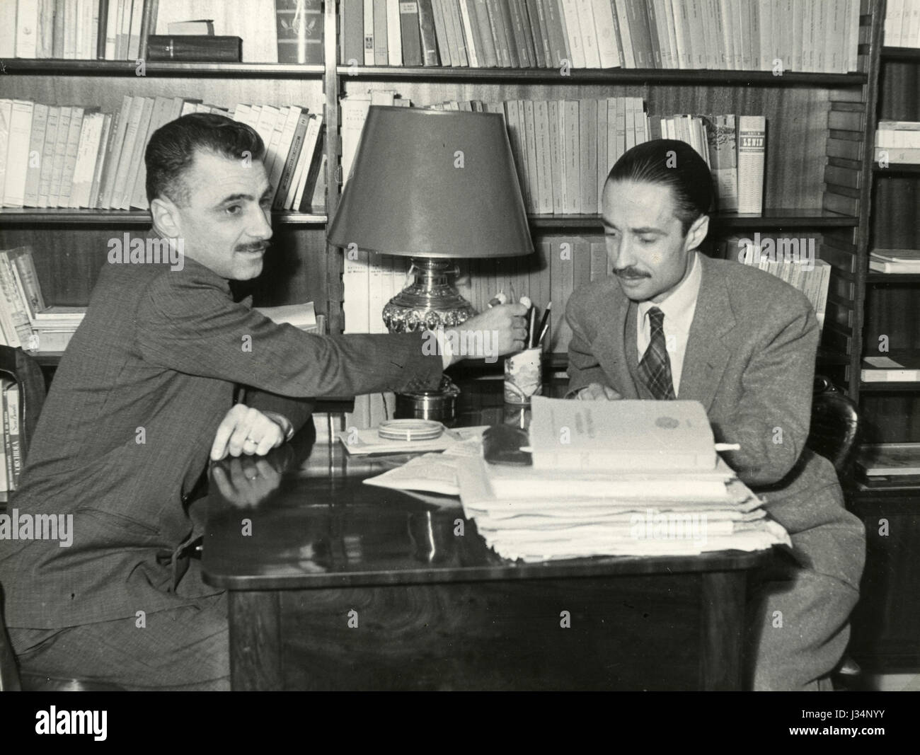 Italian movie director Mario Monicelli and Steno at home, 1954 Stock Photo