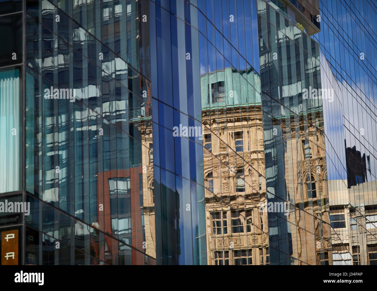 Modern glass offices reflect in the window of Millennium tower Boston  Massachusetts, United States, USA, Stock Photo