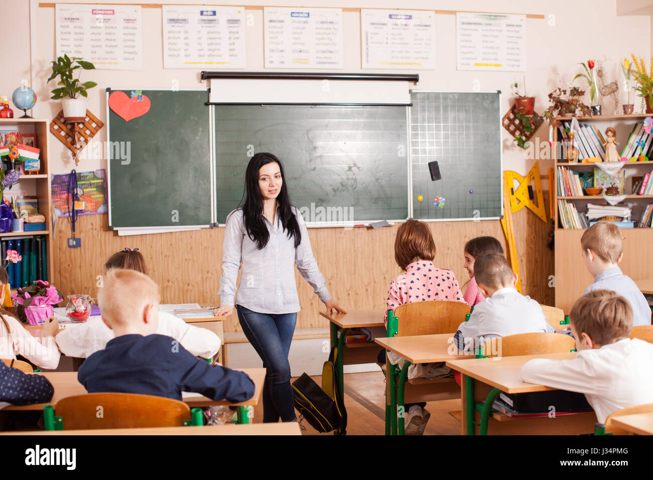 Teacher starts the lesson Stock Photo - Alamy