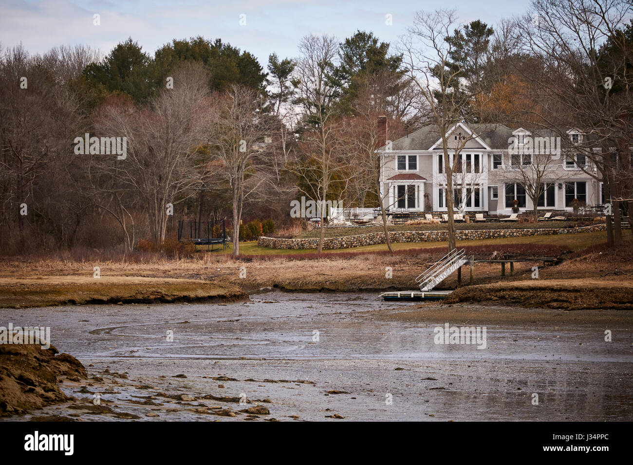 Large coastal house looking into the harbor Manchester by the Sea
