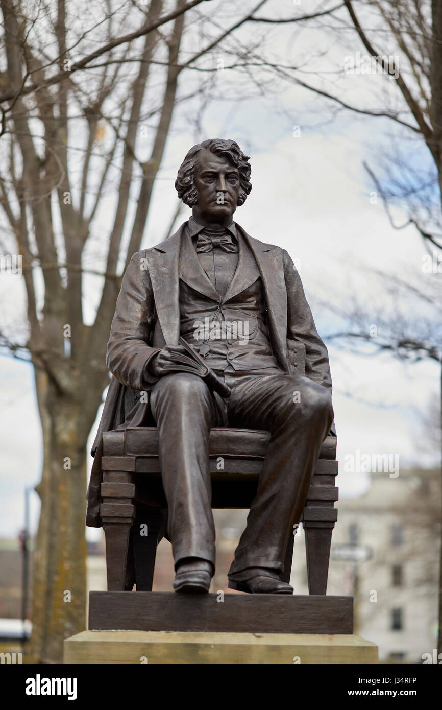 Anne Whitney designed  Charles Sumner statue in Harvard Square, Harvard University building , Cambridge,  Boston, Massachusetts, United States, USA, Stock Photo