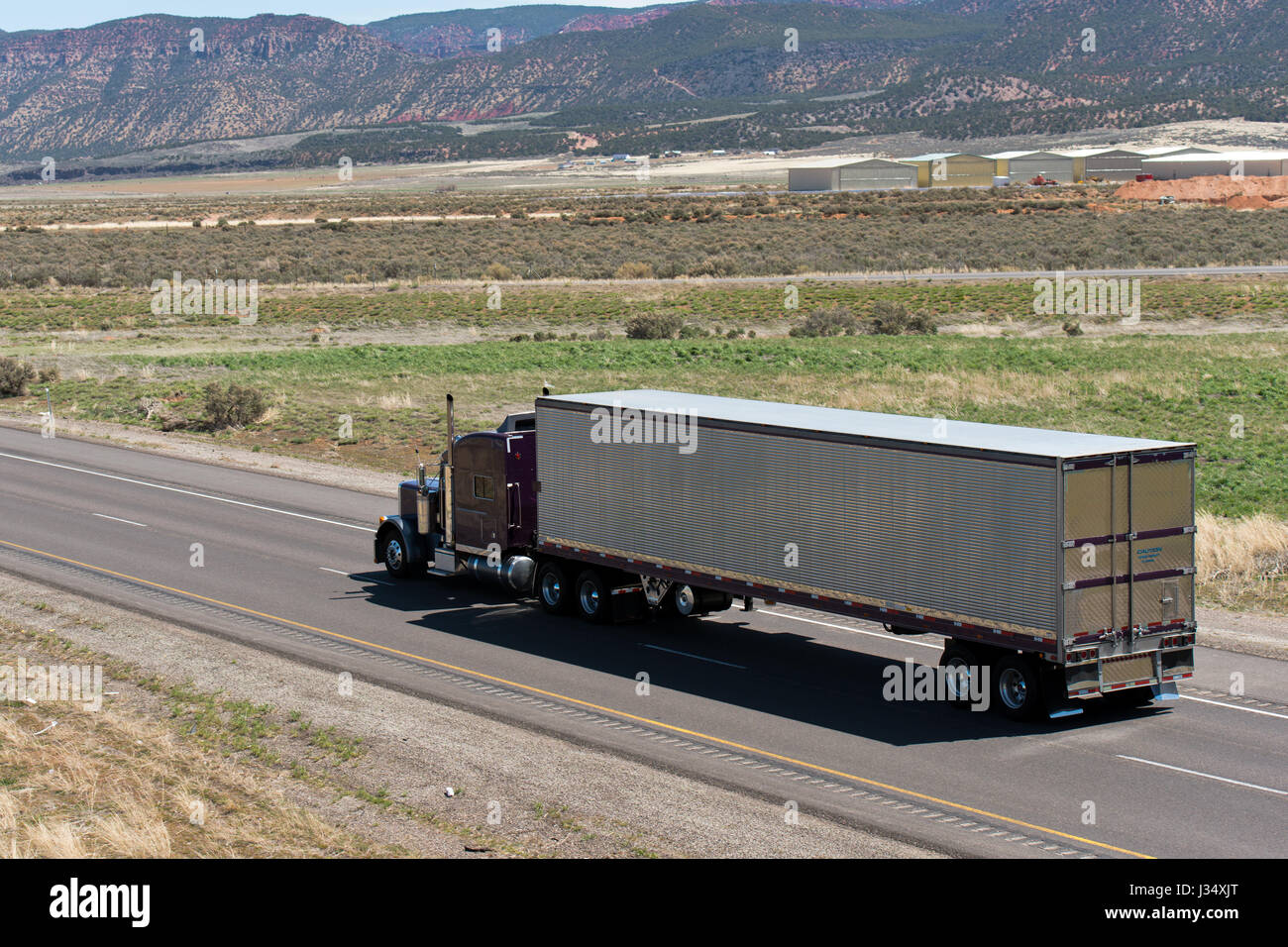 Reefer Big Rig Big rig classic american semi truck with reefer semi trailer on the ...