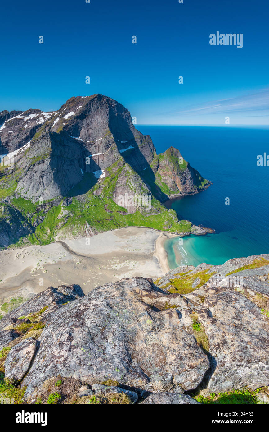 Awesome view of Bunes beach during low tide, on a perfect day with blue sky and an equally blue sea water. Lofoten Islands, Norway Stock Photo