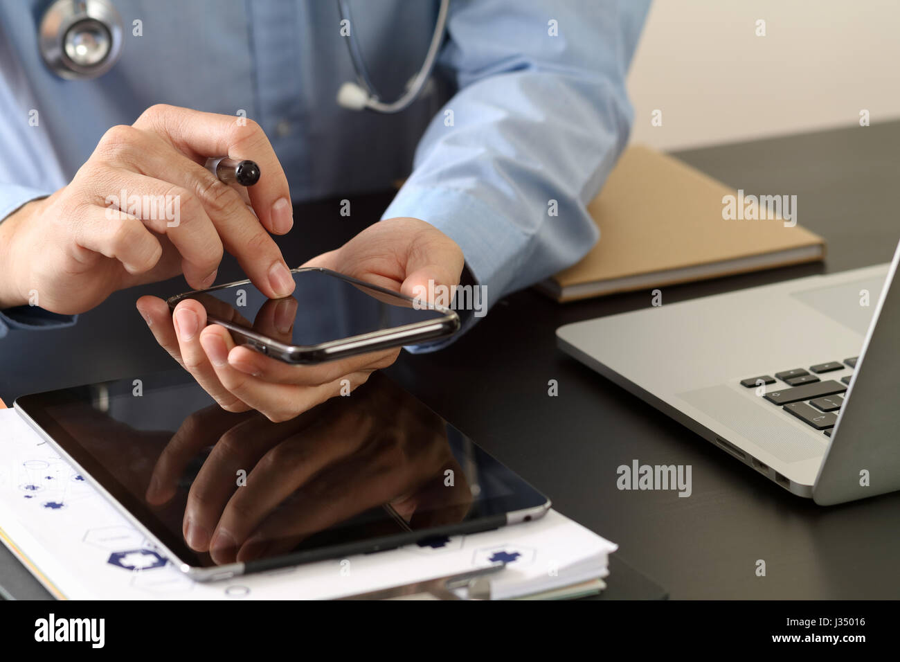 smart medical doctor working with smart phone and stethoscope and ...
