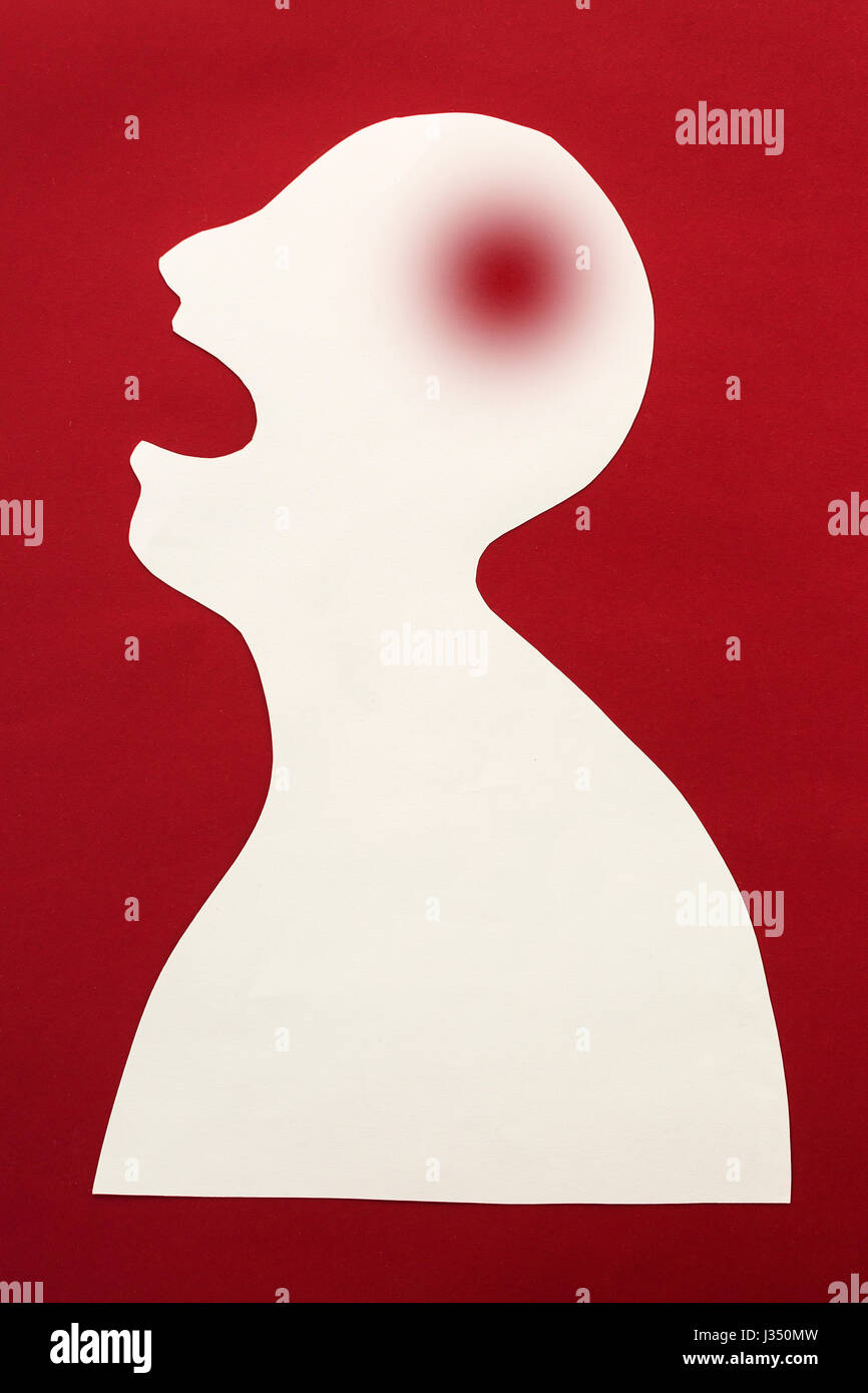 concept of human disease diagnosis and pain localization on silhouette - contour of abstract white man with opened mouth and sore spot in the head, isolated on red background, top view, flat lay. Stock Photo