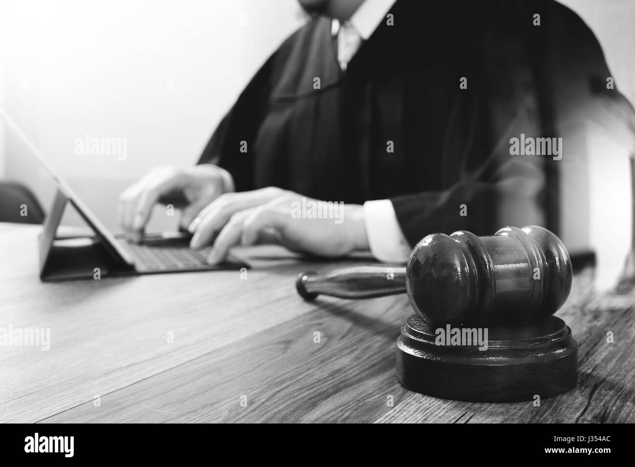 justice and law concept.Male judge in a courtroom with the gavel