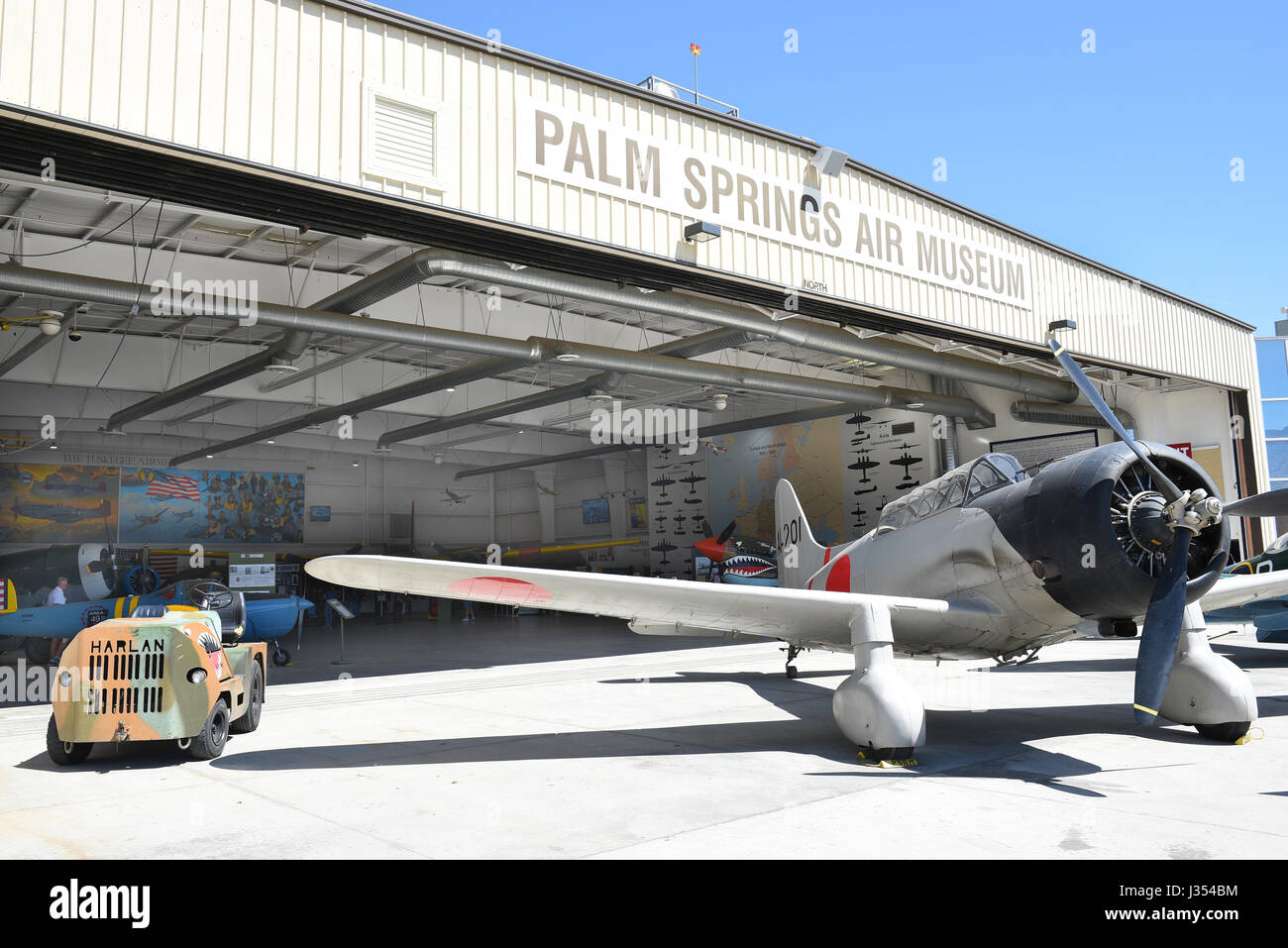 Hangar and vintage plane at the Palm Springs Air Museum. Stock Photo