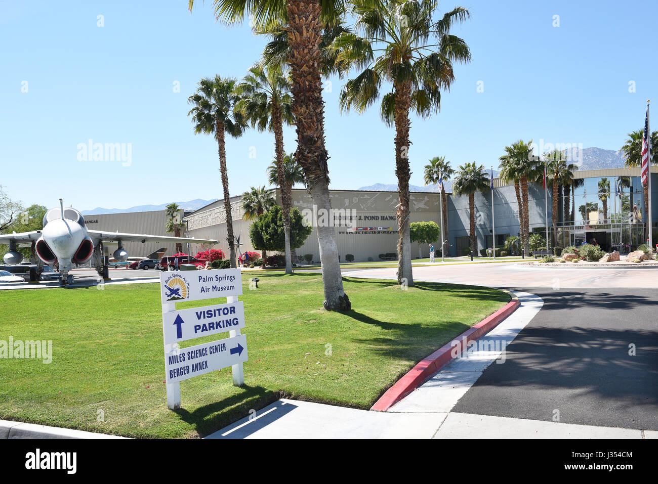 PALM SPRINGS, CA - MARCH 24, 2017: Palm Springs Air Museum sign and vintage jet fighter with entrance in the background. Stock Photo