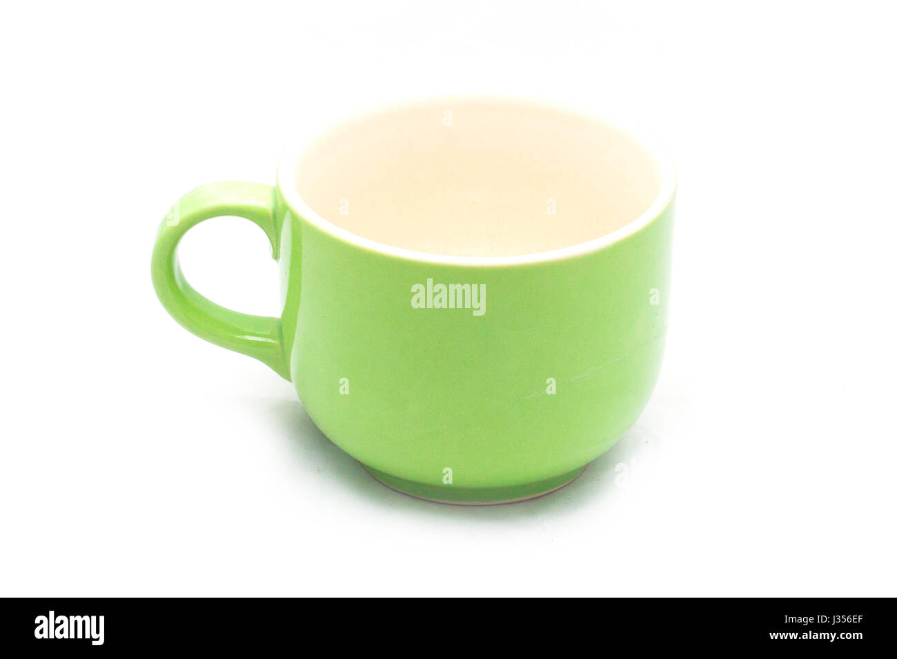 Coffee cup green color on white background Stock Photo Alamy