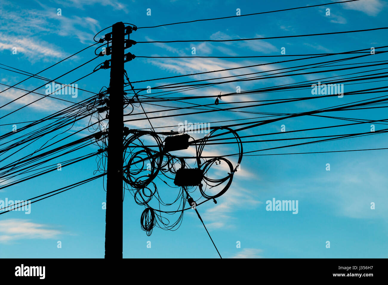 Power cord on the fire pole silhouette in evening Stock Photo Alamy