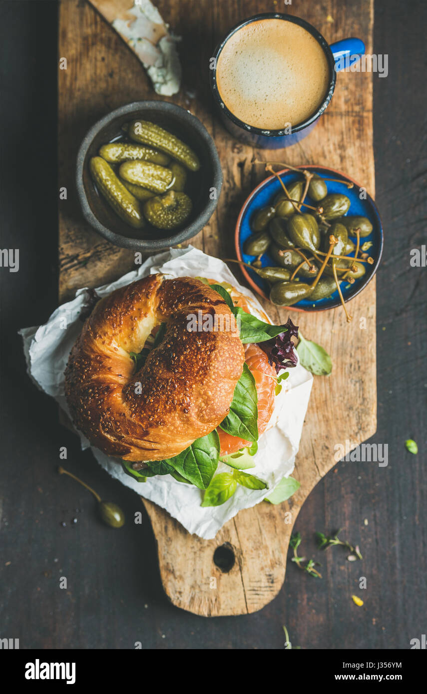 Breakfast with bagel, espresso coffee, capers and pickles Stock Photo