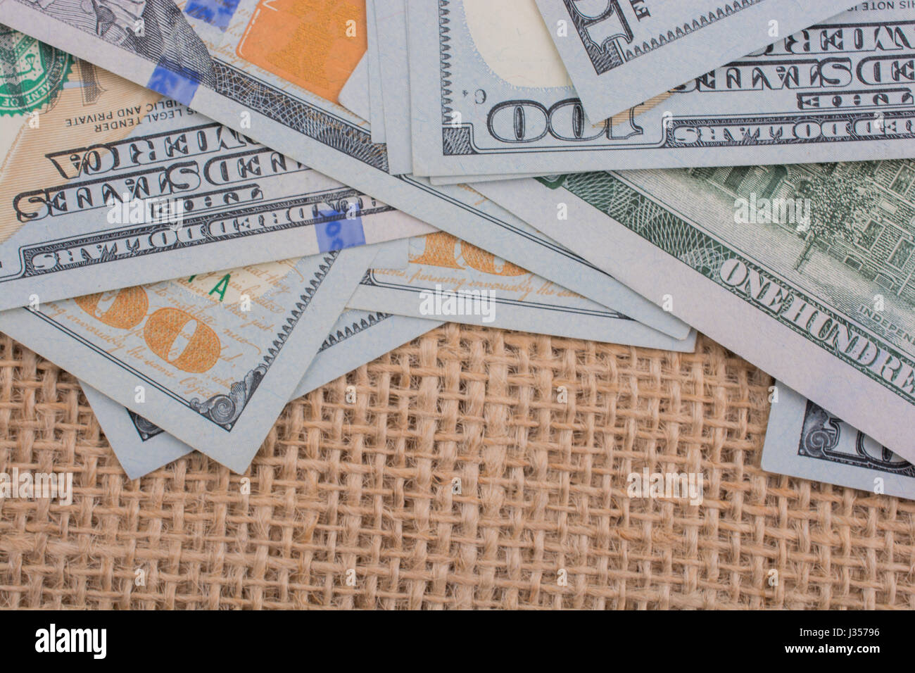 Banknote of US dollar placed on a linen canvas Stock Photo - Alamy